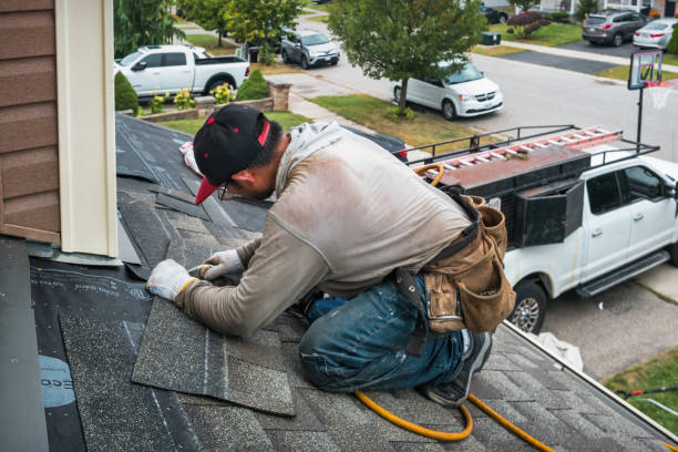 Professional Roofing technician working in Saint Ann, MO